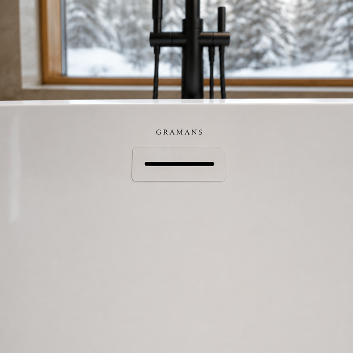 Hilversum 54 inch freestanding bathtub, close-up of white overflow, Gramans Bathware