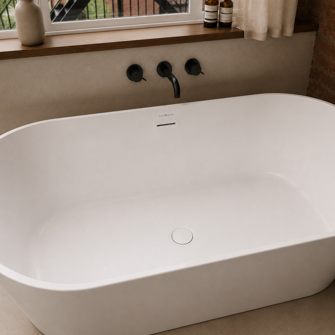 Hilversum 59 inch freestanding bathtub, close-up of matching white drain and overflow, Gramans Bathware