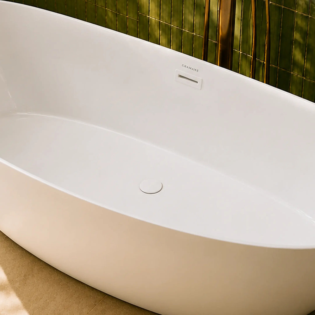 Naarden 67 inch freestanding bathtub, close-up of matching white drain and overflow, Gramans Bathware