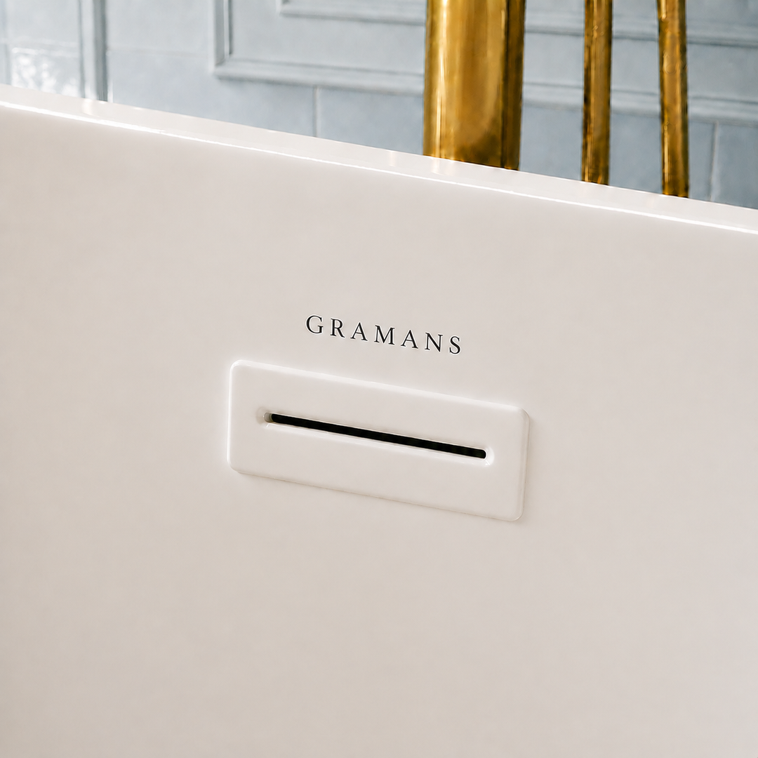 Naarden 71 inch freestanding bathtub, close-up of white overflow with Gramans mark, Gramans Bathware