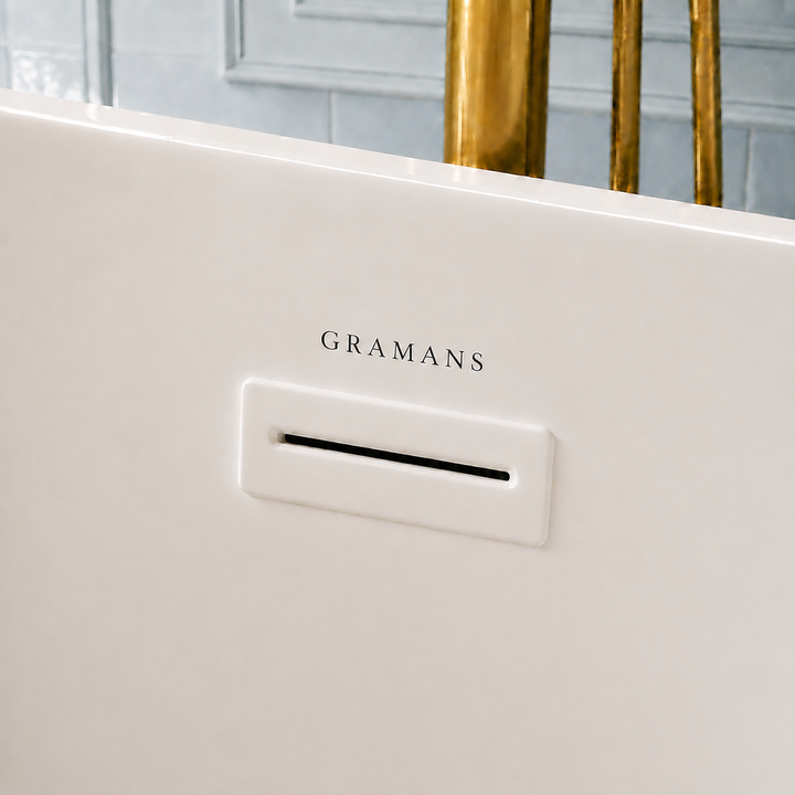 Naarden 71 inch freestanding bathtub, close-up of white overflow with Gramans mark, Gramans Bathware