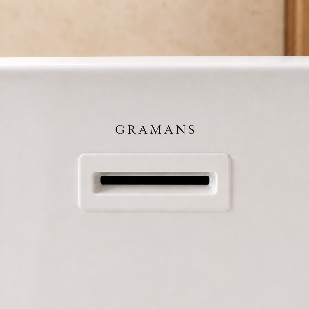 Laren 67 inch freestanding bathtub, close-up of matching white overflow, Gramans Bathware